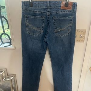 Men’s Wrangler Rock 47 Jean- slim boot